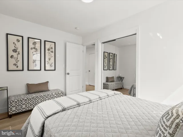 a kitchen with a sink cabinets and window