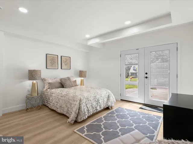 a view of a house with a yard and tree s