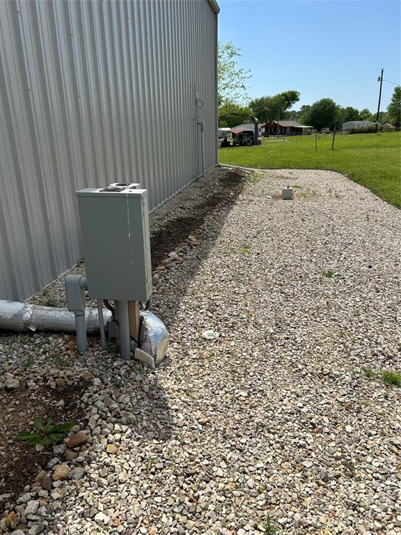 247 Comanche Quitman, TX 75783 - Photo 4 of 12 a backyard of a house with lots of green space