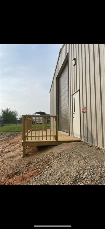 247 Comanche Quitman, TX 75783 - Photo 9 of 12 a view of a house with roof deck