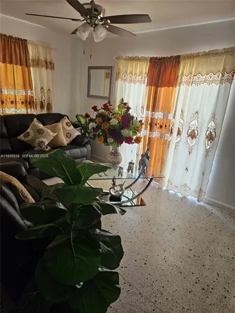 a room with gym equipment and window