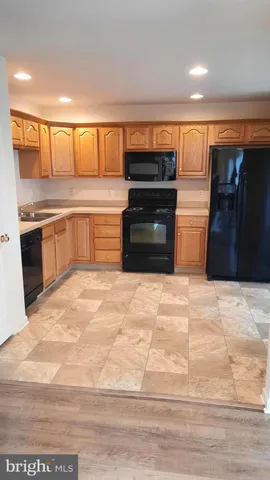 a view of a kitchen with a sink