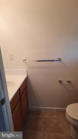 a bathroom with a sink and toilet