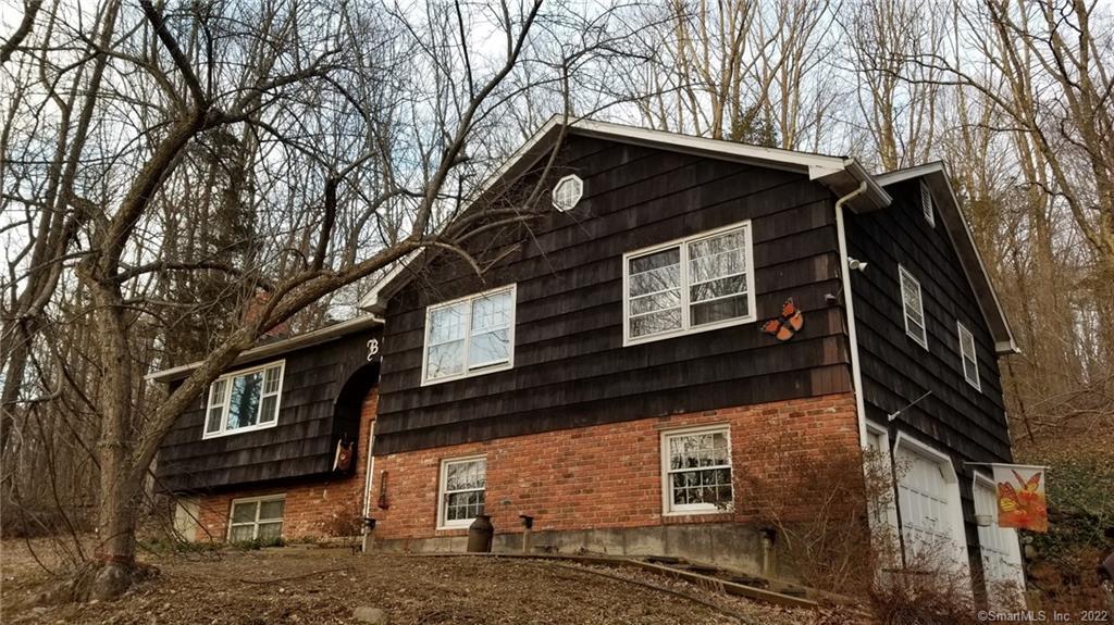 92 Captain Wooster Road Oxford, CT 06478 - Photo 1 of 1 a view of a house with a large tree