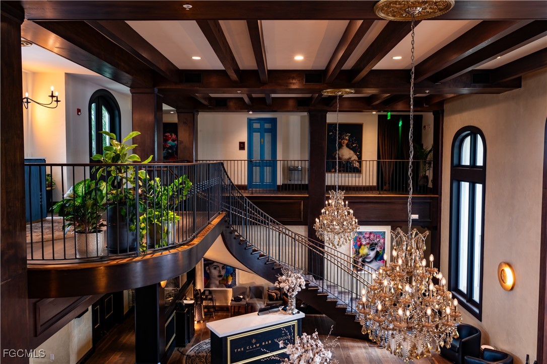 a front view of a house with plants