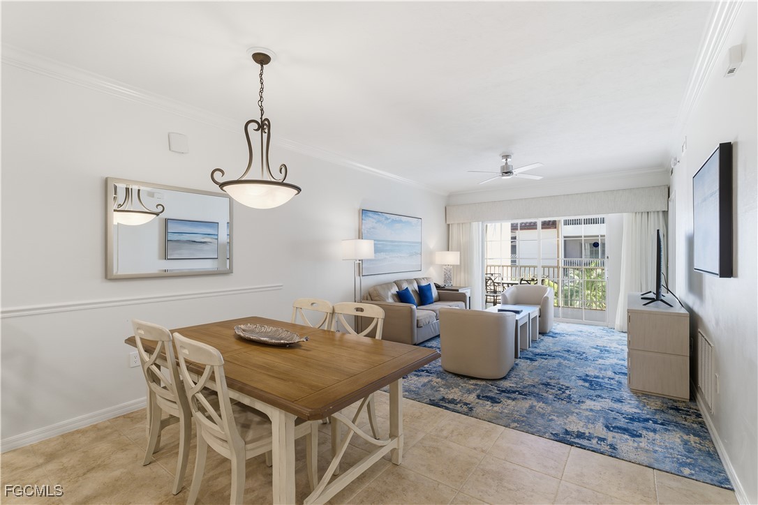 221 9th Street South, Unit 207 Naples, FL 34102 - Photo 14 of 38 a dining room with furniture and window