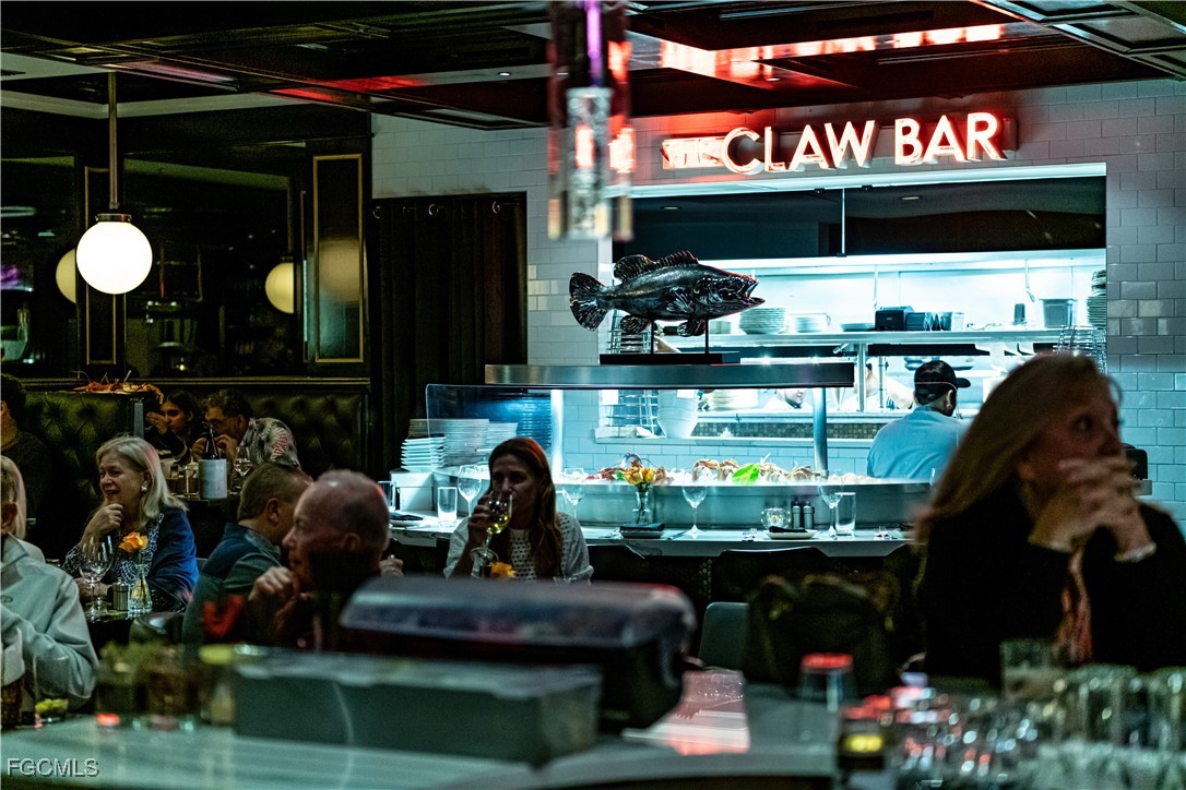 221 9th Street South, Unit 207 Naples, FL 34102 - Photo 34 of 38 a store area with lots of fruit and vegetables