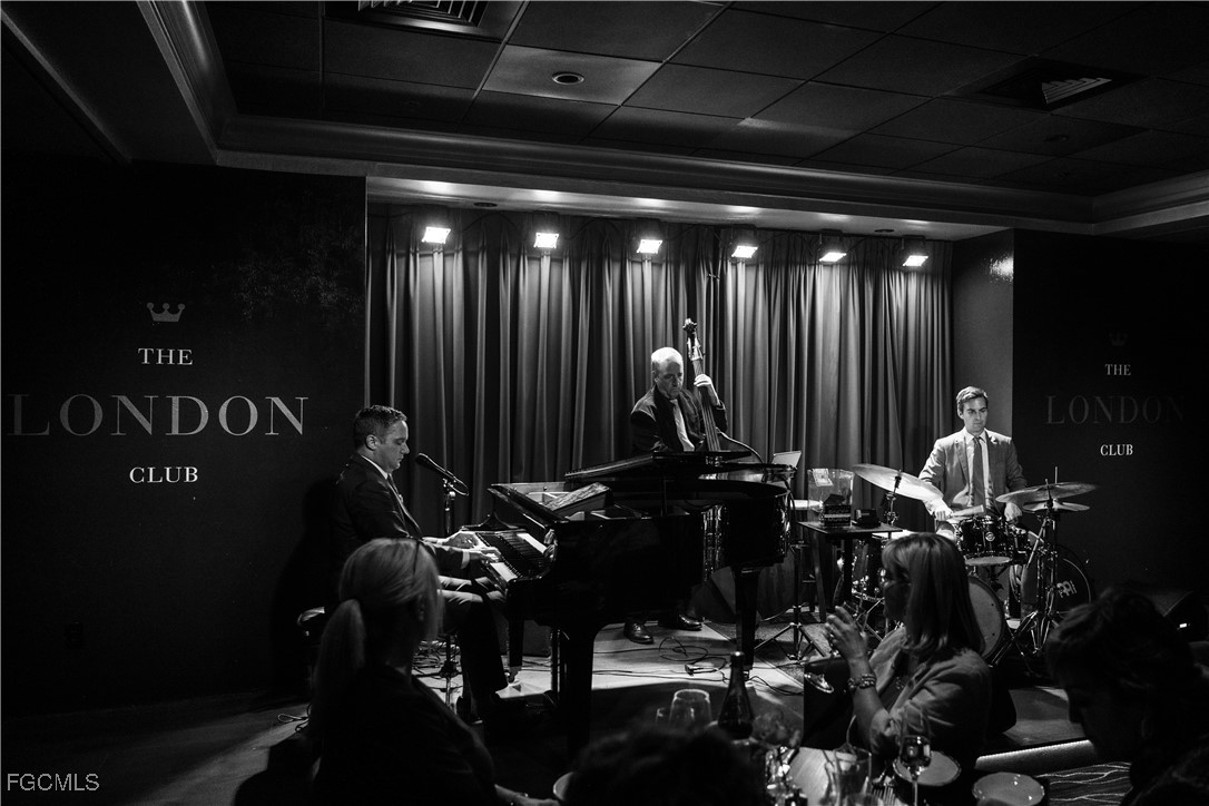 221 9th Street South, Unit 207 Naples, FL 34102 - Photo 35 of 38 a view of a room with gym equipment