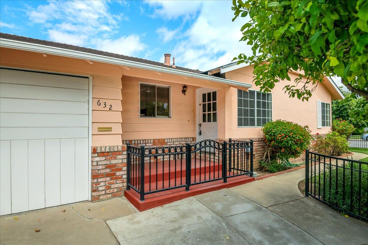 1198 Boranda Avenue Mountain View, CA 94040 - Photo 2 of 38 a view of a house with a small yard and wooden fence