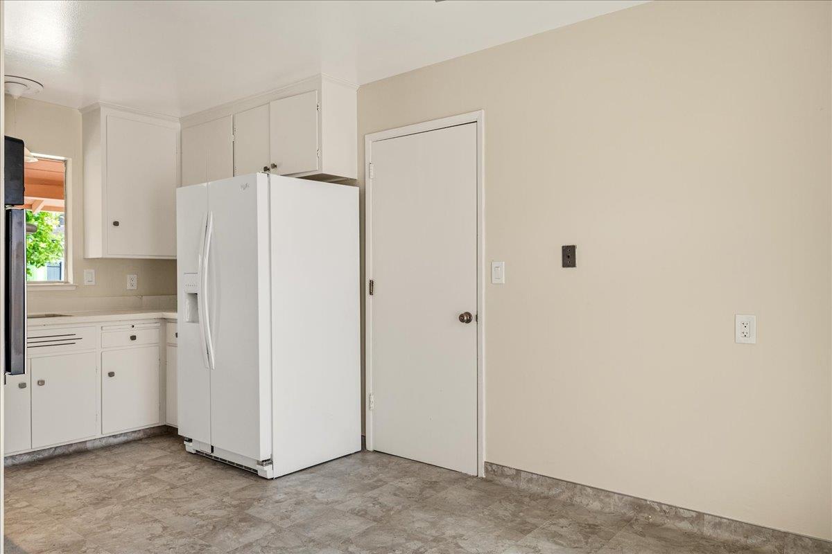 1198 Boranda Avenue Mountain View, CA 94040 - Photo 22 of 38 a view of cabinets and refrigerator