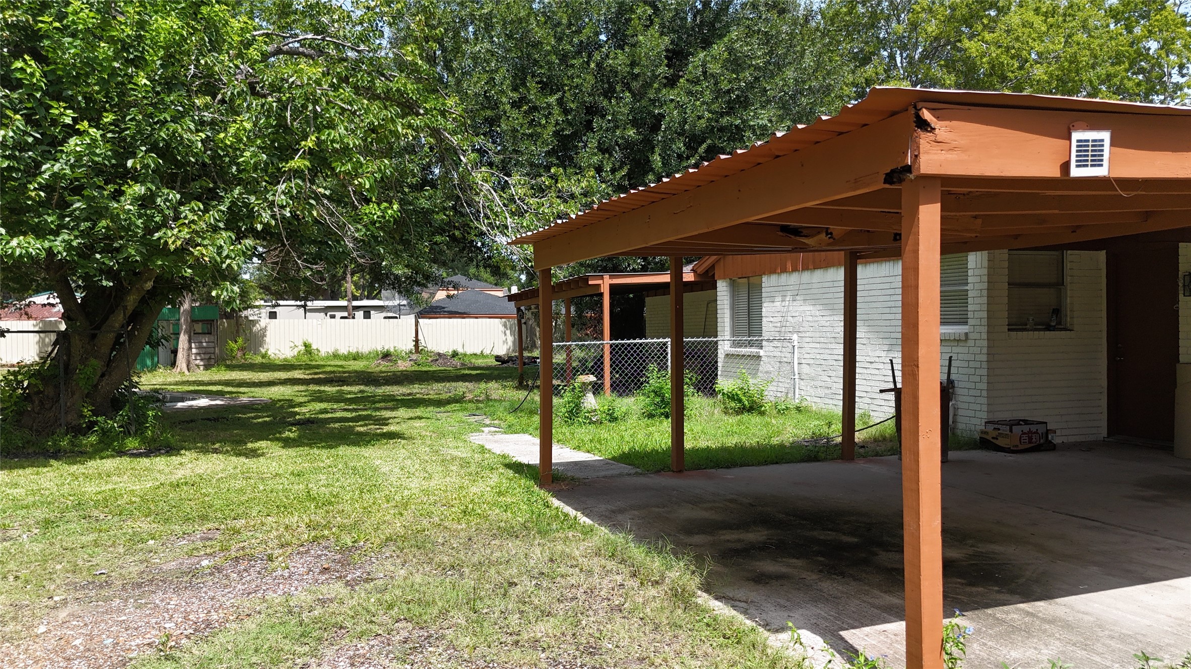 10005 Cypress North Houston Road Houston, TX 77070 - Photo 14 of 31 a view of a house with backyard and a tree