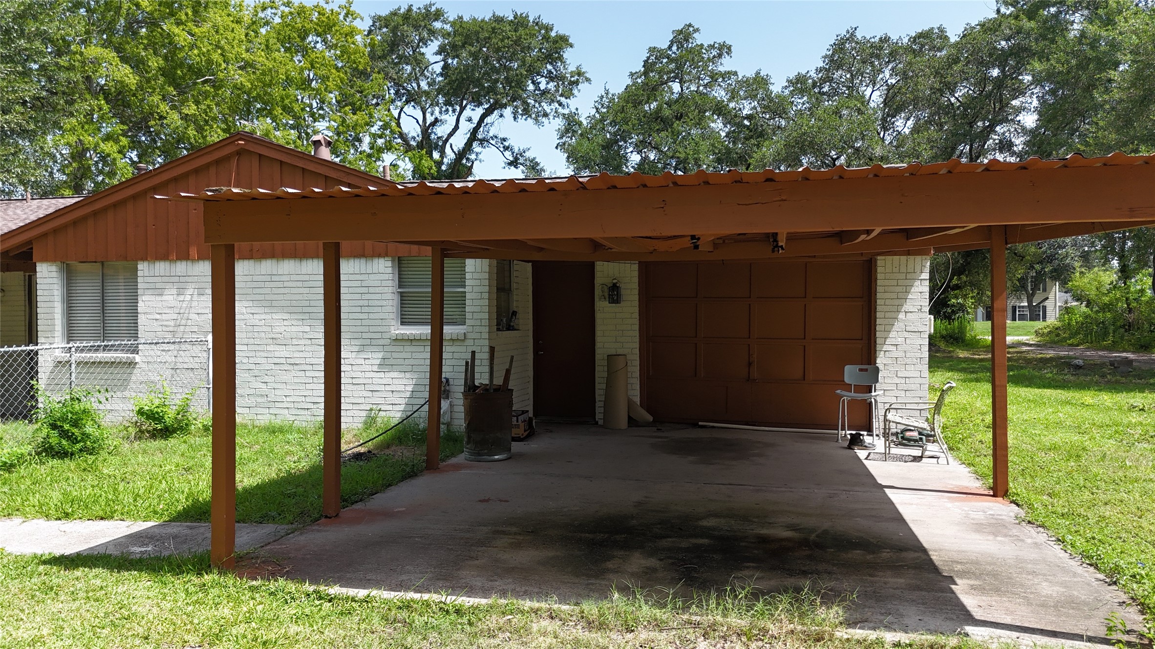 10005 Cypress North Houston Road Houston, TX 77070 - Photo 15 of 31 a front view of a house with a yard