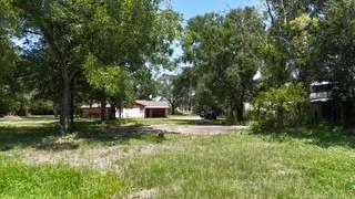 a house that is sitting in the forest