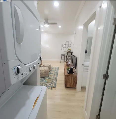 a bathroom with a sink vanity and mirror