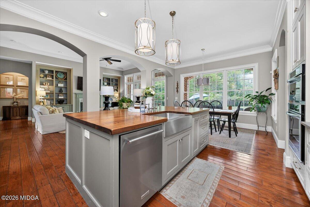 106 Lagrange Place Macon, GA 31210 - Photo 12 of 76 a kitchen with stainless steel appliances granite countertop a stove and a wooden floors