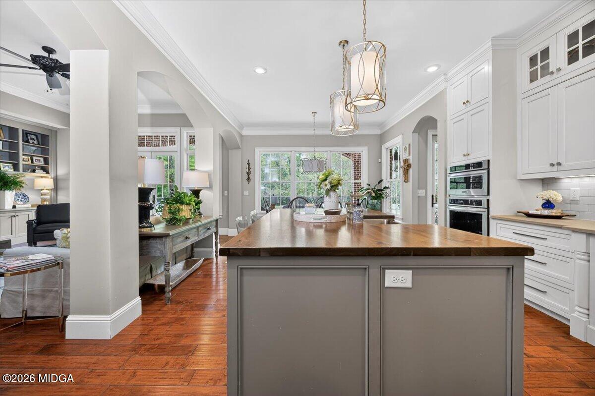 106 Lagrange Place Macon, GA 31210 - Photo 15 of 76 a kitchen with stainless steel appliances granite countertop a sink and a refrigerator