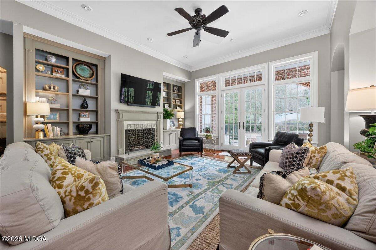 106 Lagrange Place Macon, GA 31210 - Photo 19 of 76 a living room with furniture or fireplace and a flat screen tv