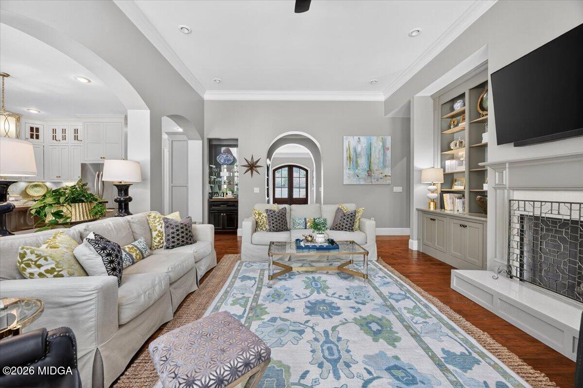 106 Lagrange Place Macon, GA 31210 - Photo 21 of 76 a living room with furniture fireplace and flat screen tv
