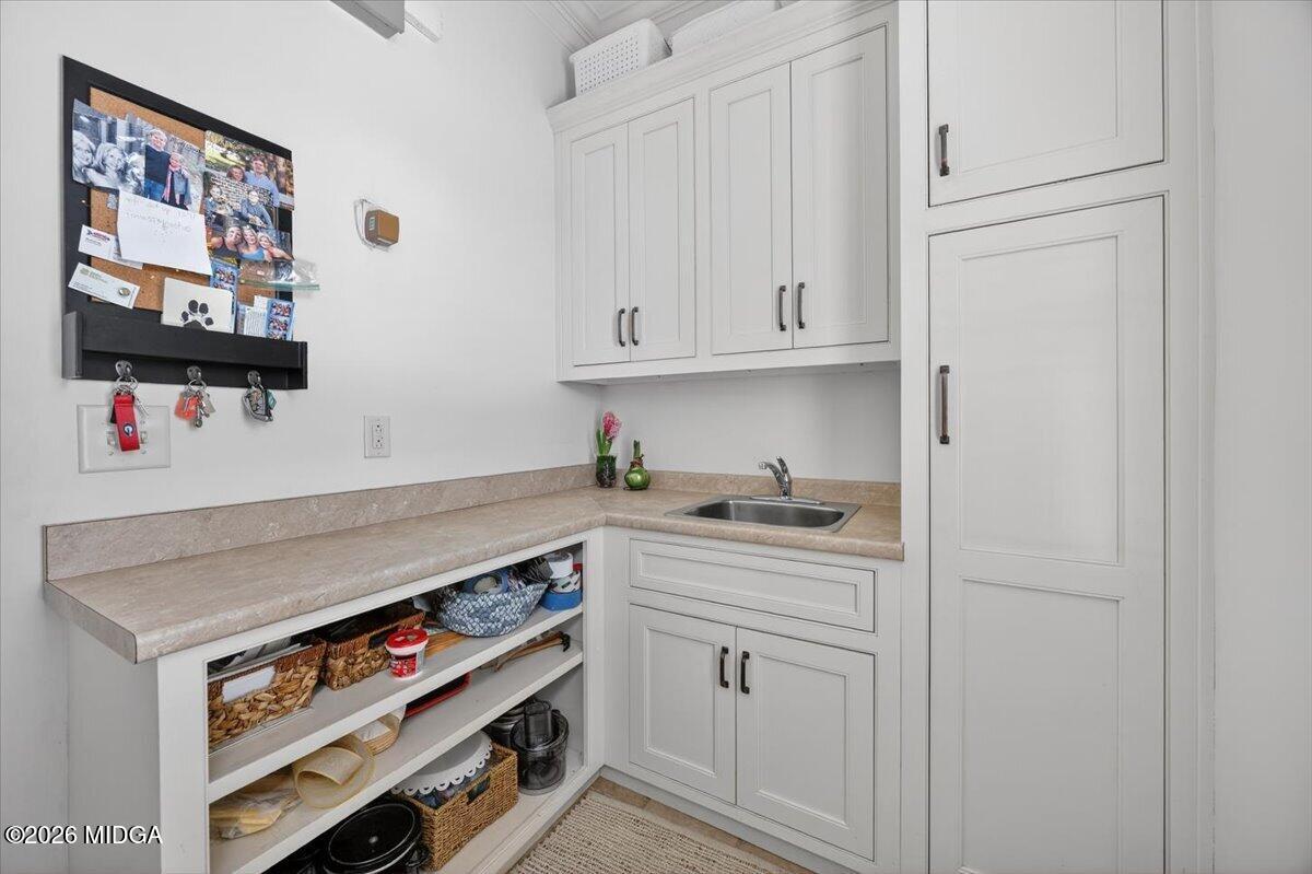 106 Lagrange Place Macon, GA 31210 - Photo 32 of 76 a kitchen with stainless steel appliances granite countertop a sink and a stove
