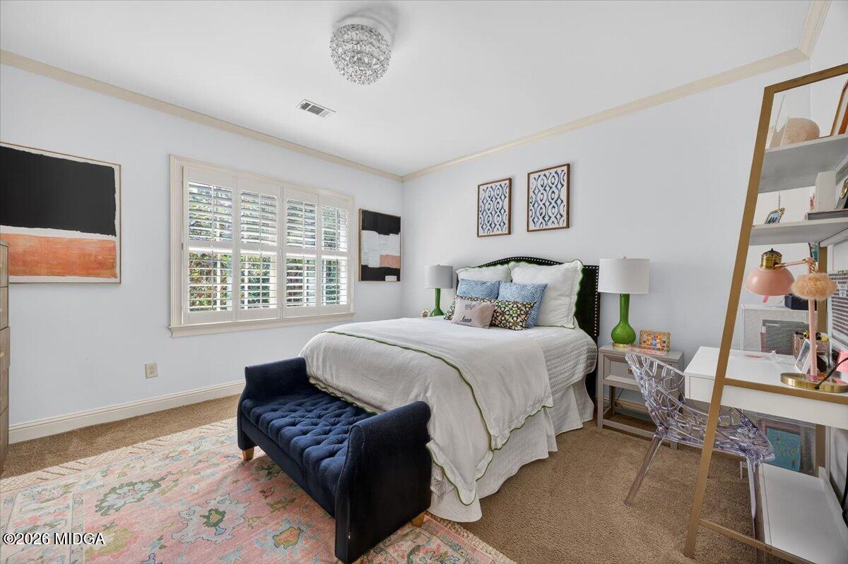 106 Lagrange Place Macon, GA 31210 - Photo 37 of 76 a bedroom with a bed and a couch