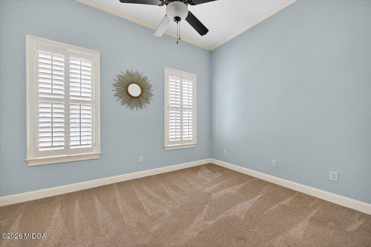 106 Lagrange Place Macon, GA 31210 - Photo 40 of 76 an empty room with windows and fan