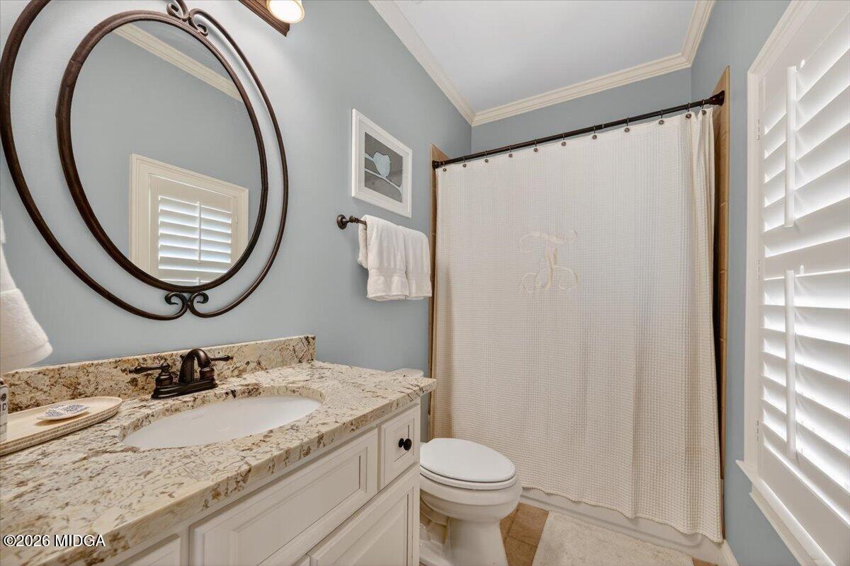 106 Lagrange Place Macon, GA 31210 - Photo 42 of 76 a bathroom with a granite countertop sink and a mirror