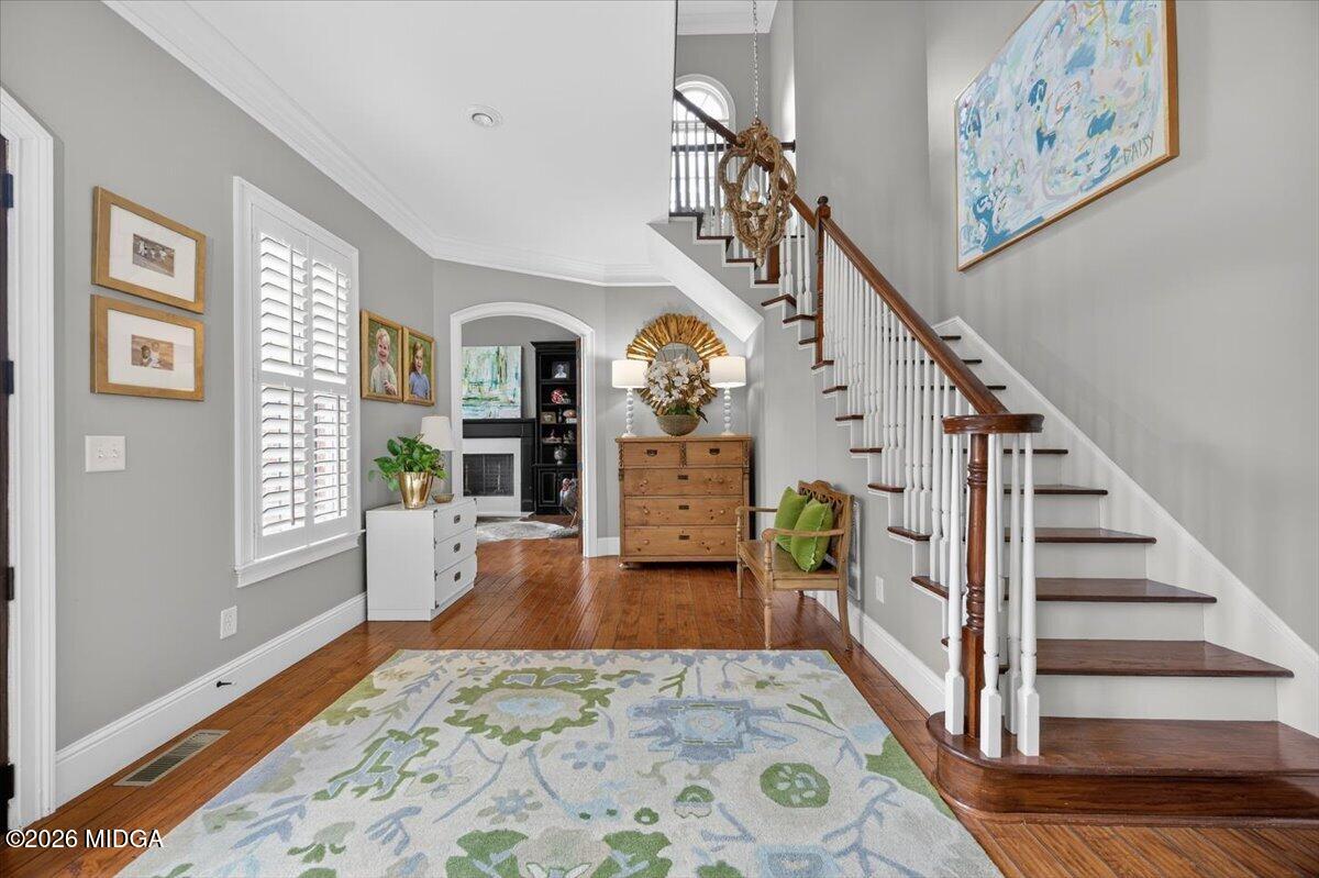 106 Lagrange Place Macon, GA 31210 - Photo 5 of 76 a view of a livingroom with wooden floor and a large window