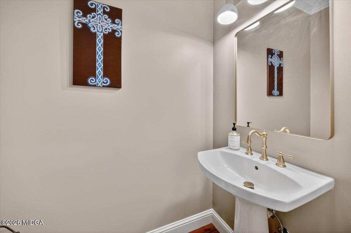 106 Lagrange Place Macon, GA 31210 - Photo 51 of 76 a bathroom with a sink and a mirror