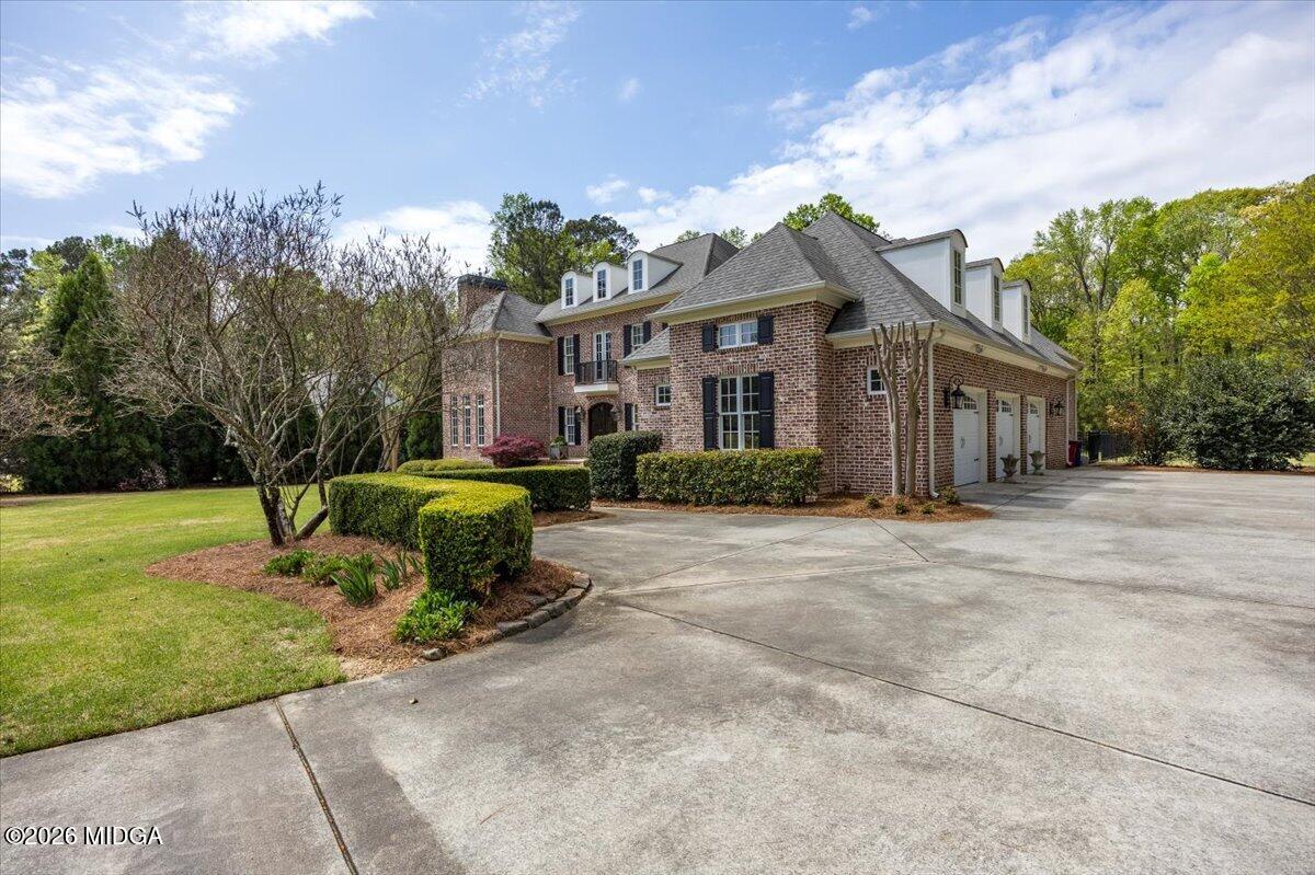 106 Lagrange Place Macon, GA 31210 - Photo 62 of 76 a house view with a garden space