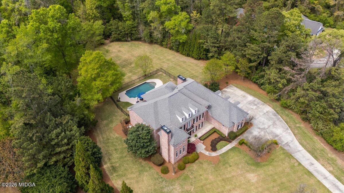 106 Lagrange Place Macon, GA 31210 - Photo 70 of 76 an aerial view of a house with swimming pool and large trees