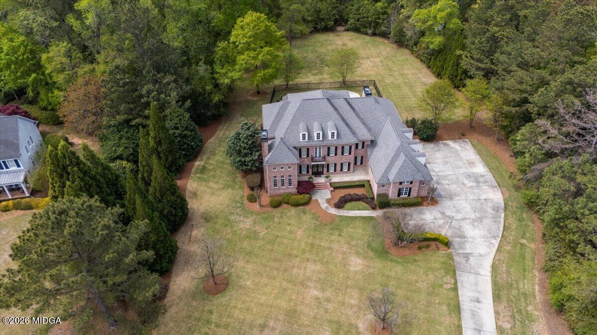 106 Lagrange Place Macon, GA 31210 - Photo 71 of 76 an aerial view of a house with swimming pool and large trees