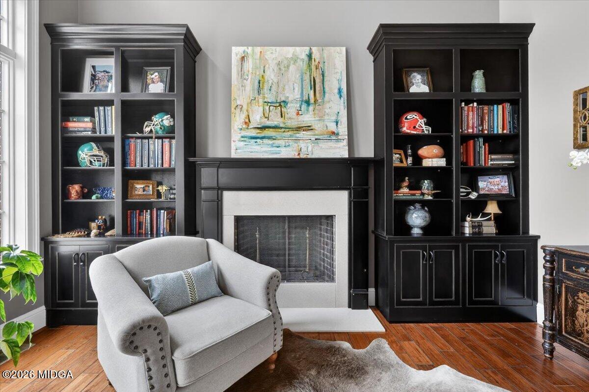 106 Lagrange Place Macon, GA 31210 - Photo 9 of 76 a living room with furniture fireplace and a book shelf
