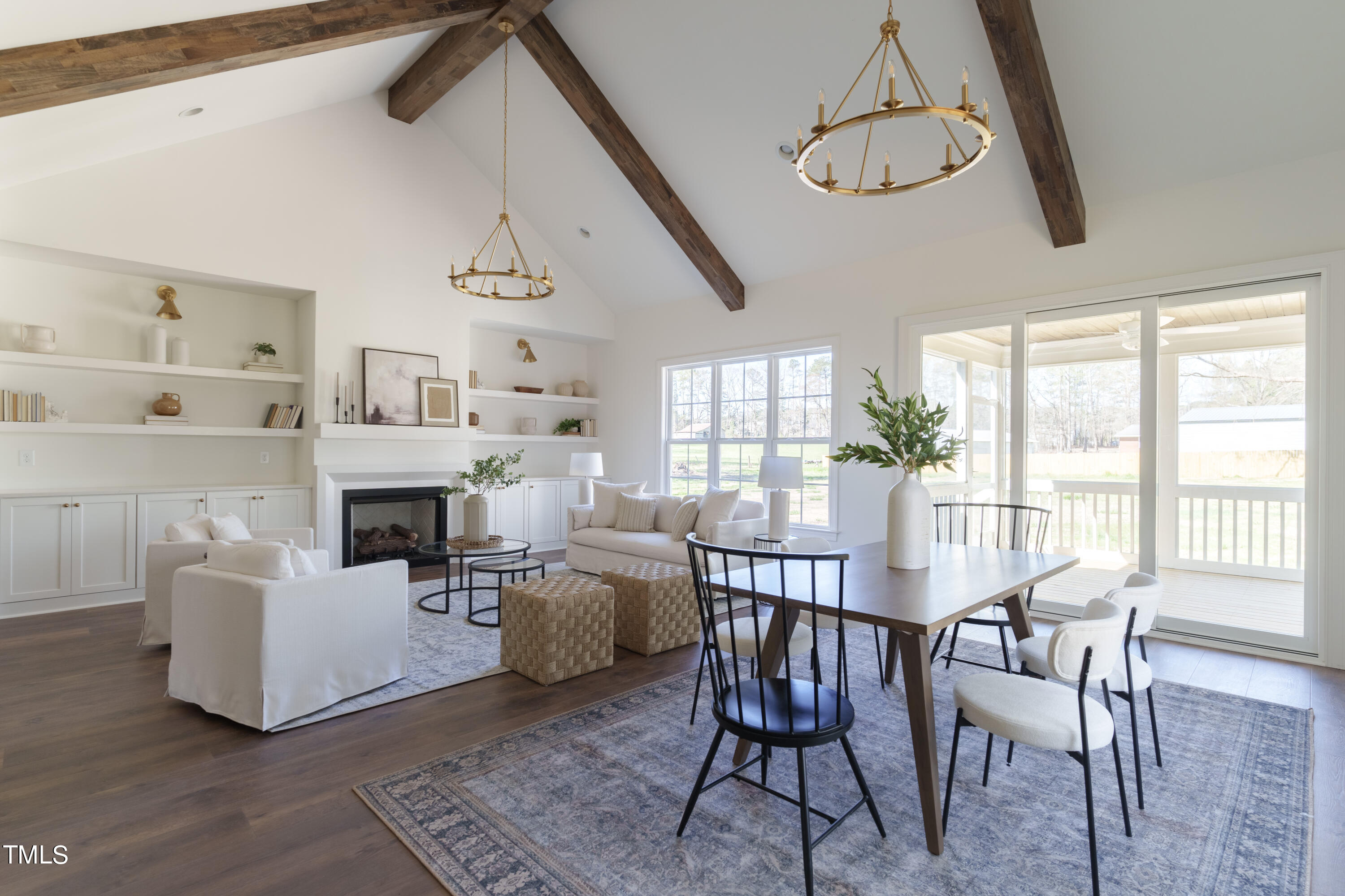2337 Pearces Road Zebulon, NC 27597 - Photo 14 of 41 a view of a livingroom with furniture window and wooden floor