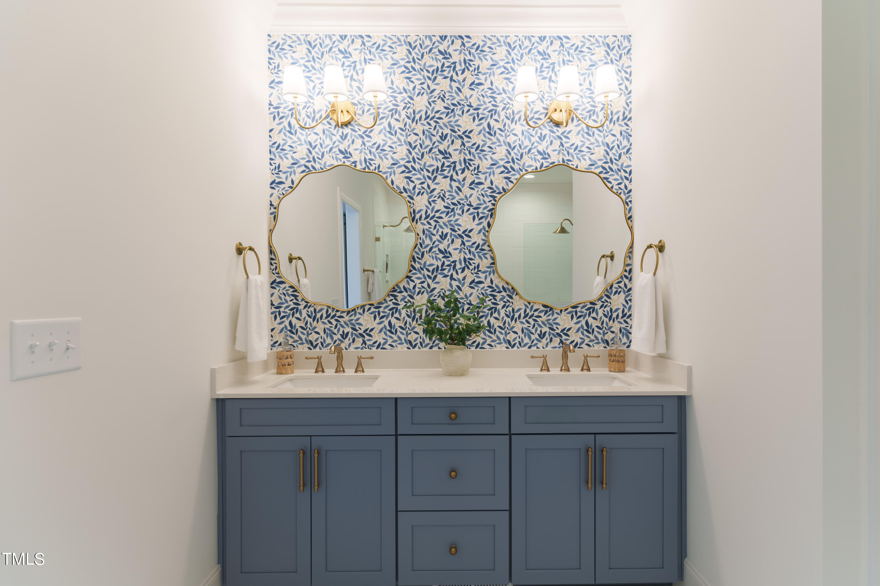 2337 Pearces Road Zebulon, NC 27597 - Photo 26 of 41 view of mirror with vanity