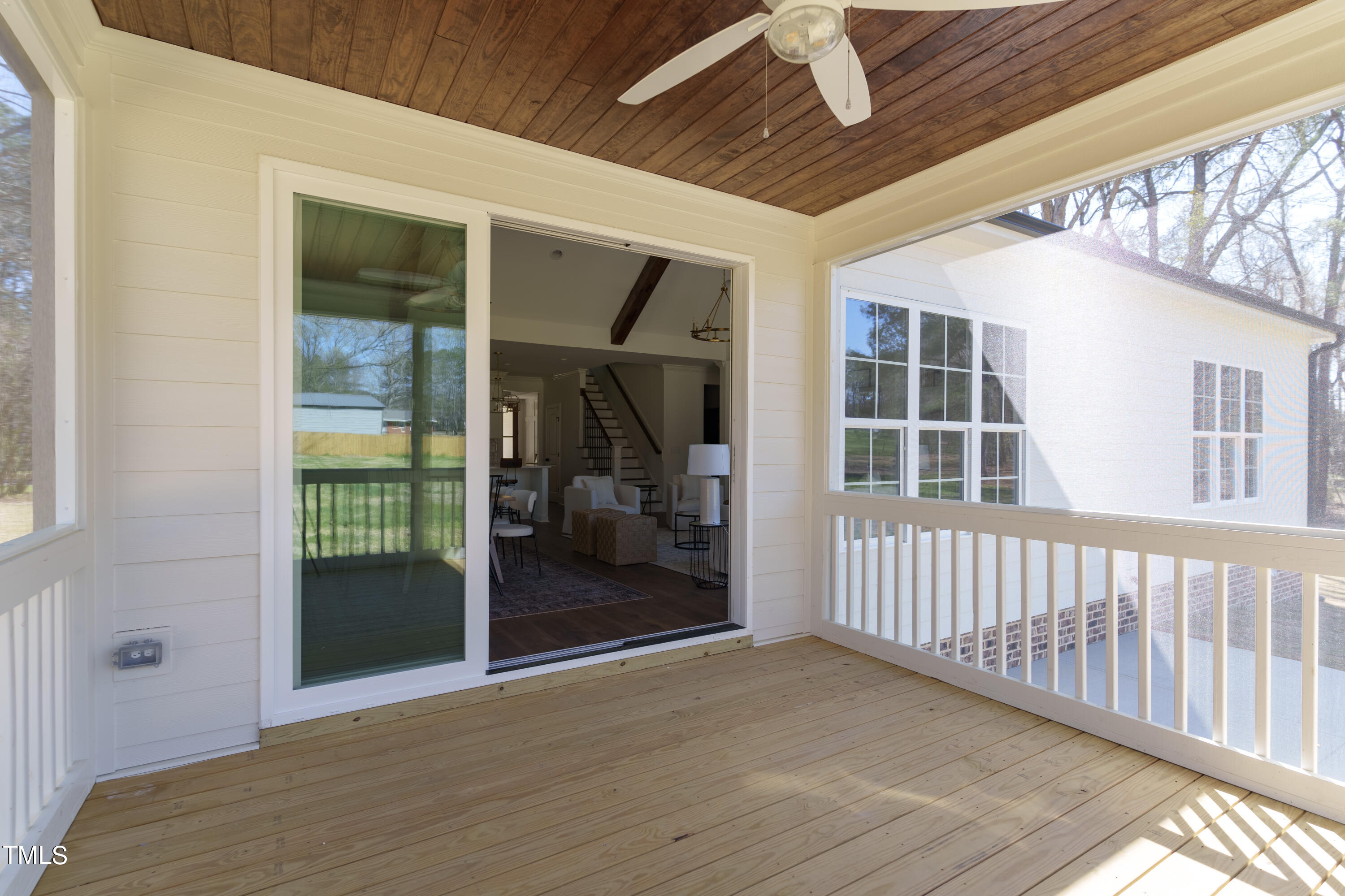 2337 Pearces Road Zebulon, NC 27597 - Photo 9 of 41 a view of livingroom with entryway and wooden floor