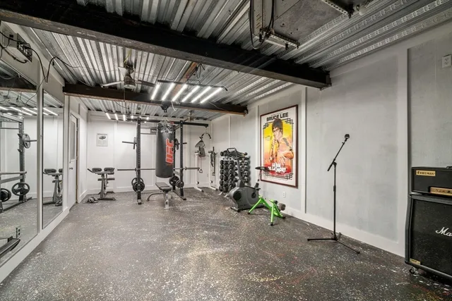a view of room with gym equipment
