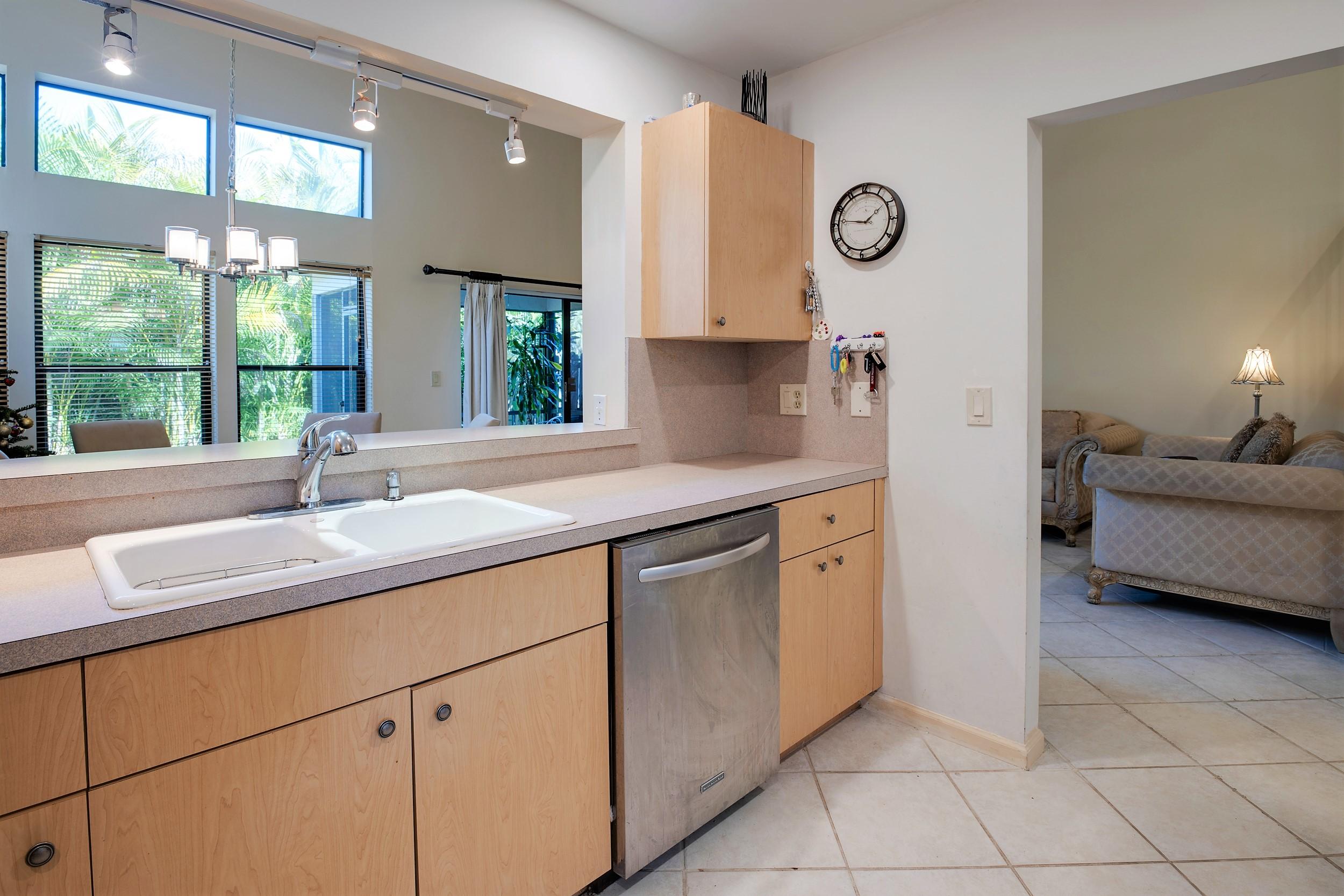 5529 Croydon Court Boca Raton, FL 33486 - Photo 14 of 30 Pass through from kitchen into dining