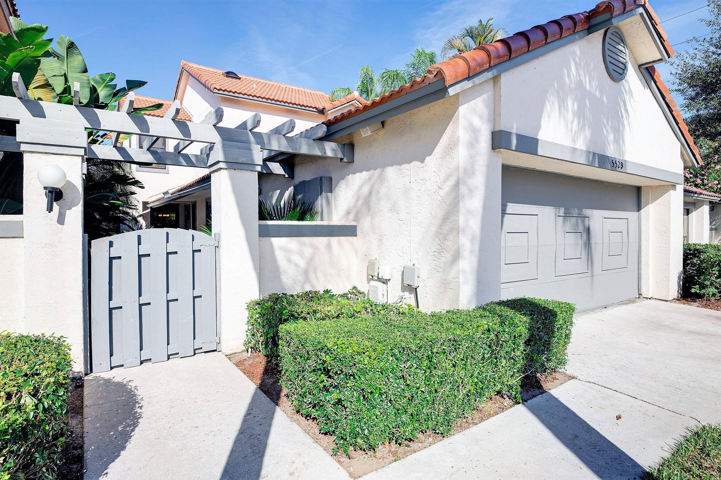 5529 Croydon Court Boca Raton, FL 33486 - Photo 3 of 30 Entry gate leads into the home
