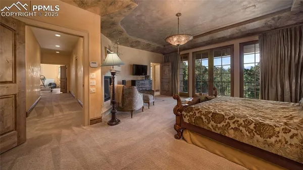 a bed room with a bed and flat screen tv