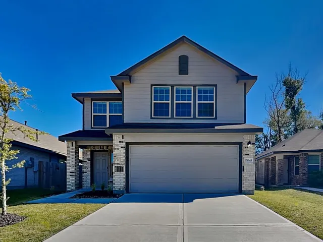 a view of a house with yard