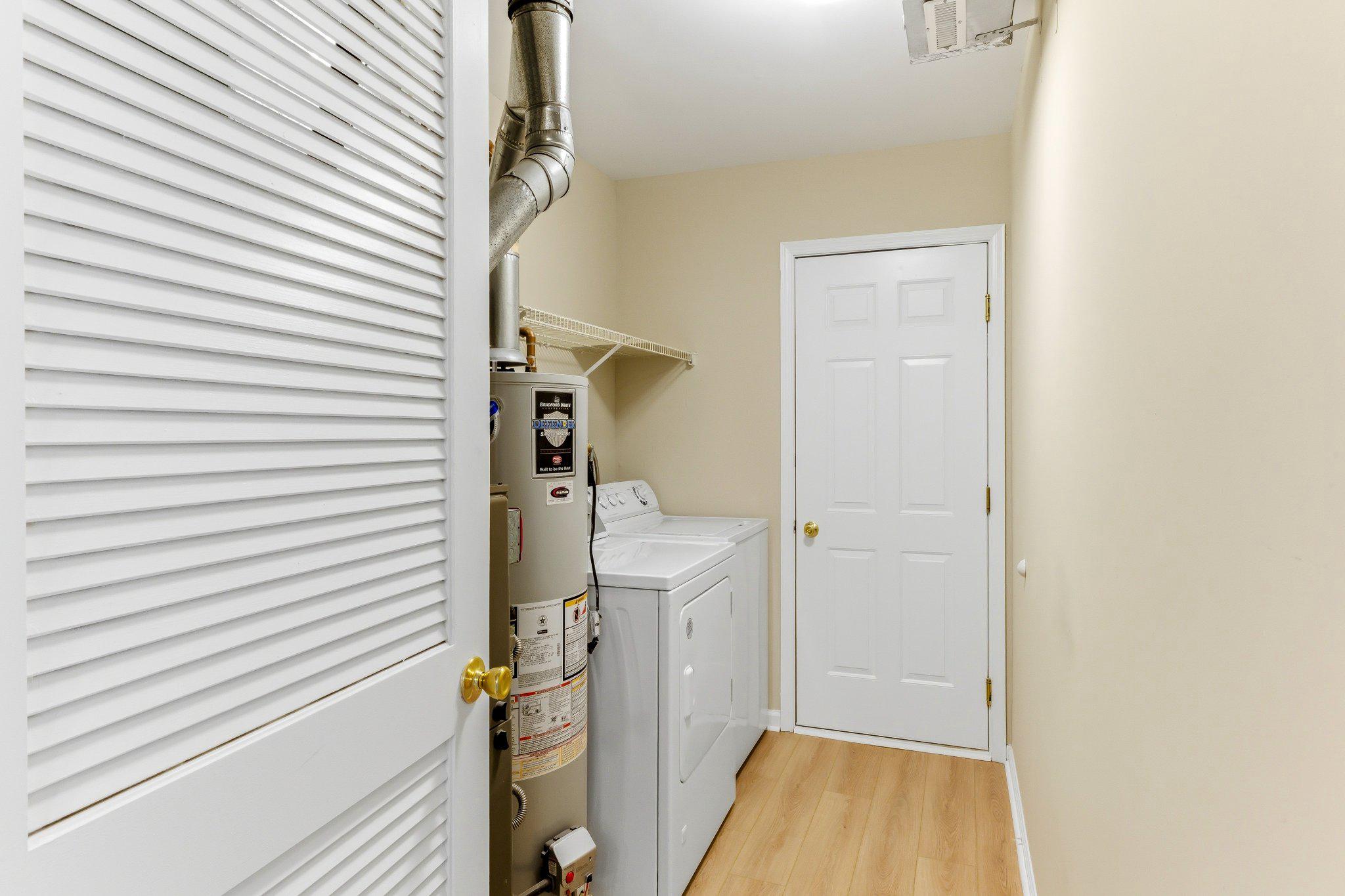 144 Alexander Road Beverly, NJ 08010 - Photo 9 of 23 Utility closet/Access to Garage.