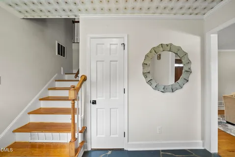 an entryway view with staircase