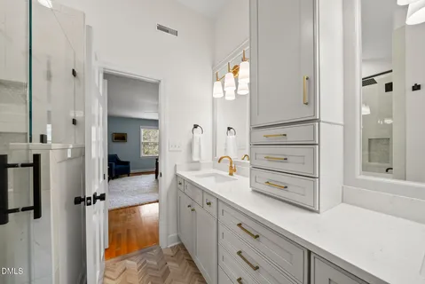 a bathroom with a bathtub and a shower