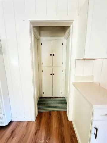 a view of front door with wooden floor