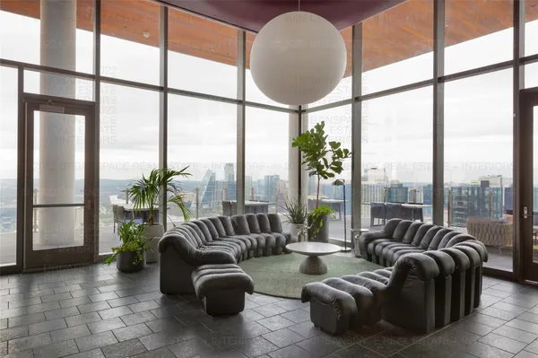 a view of a terrace with furniture and a table