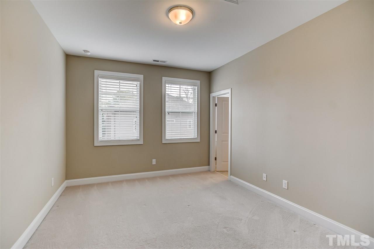3606 Winifred Way Raleigh, NC 27609 - Photo 11 of 18 an empty room with windows