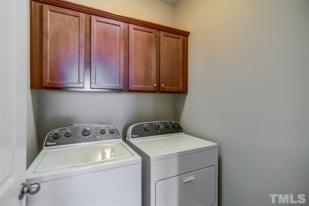 3606 Winifred Way Raleigh, NC 27609 - Photo 13 of 18 a utility room with dryer and washer