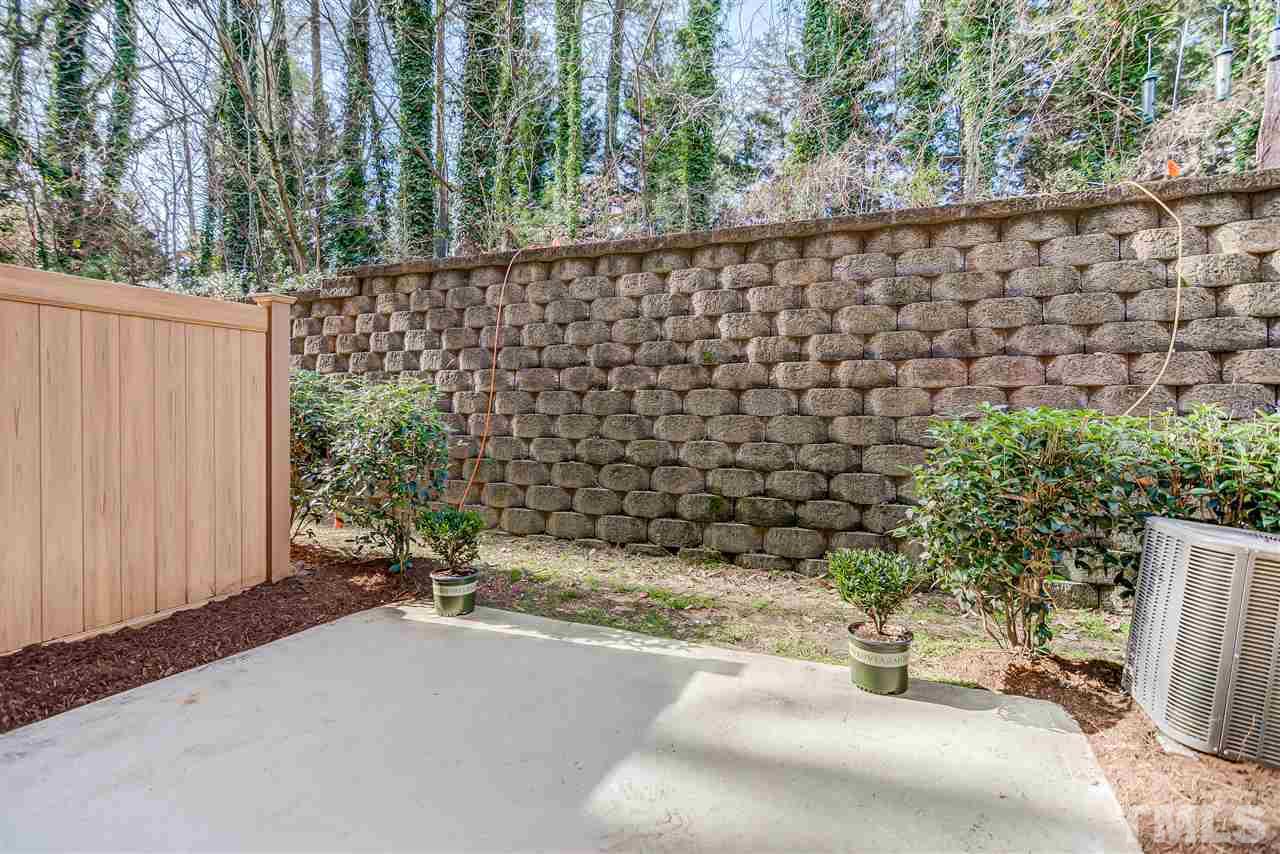3606 Winifred Way Raleigh, NC 27609 - Photo 18 of 18 a view of a terrace with a garden