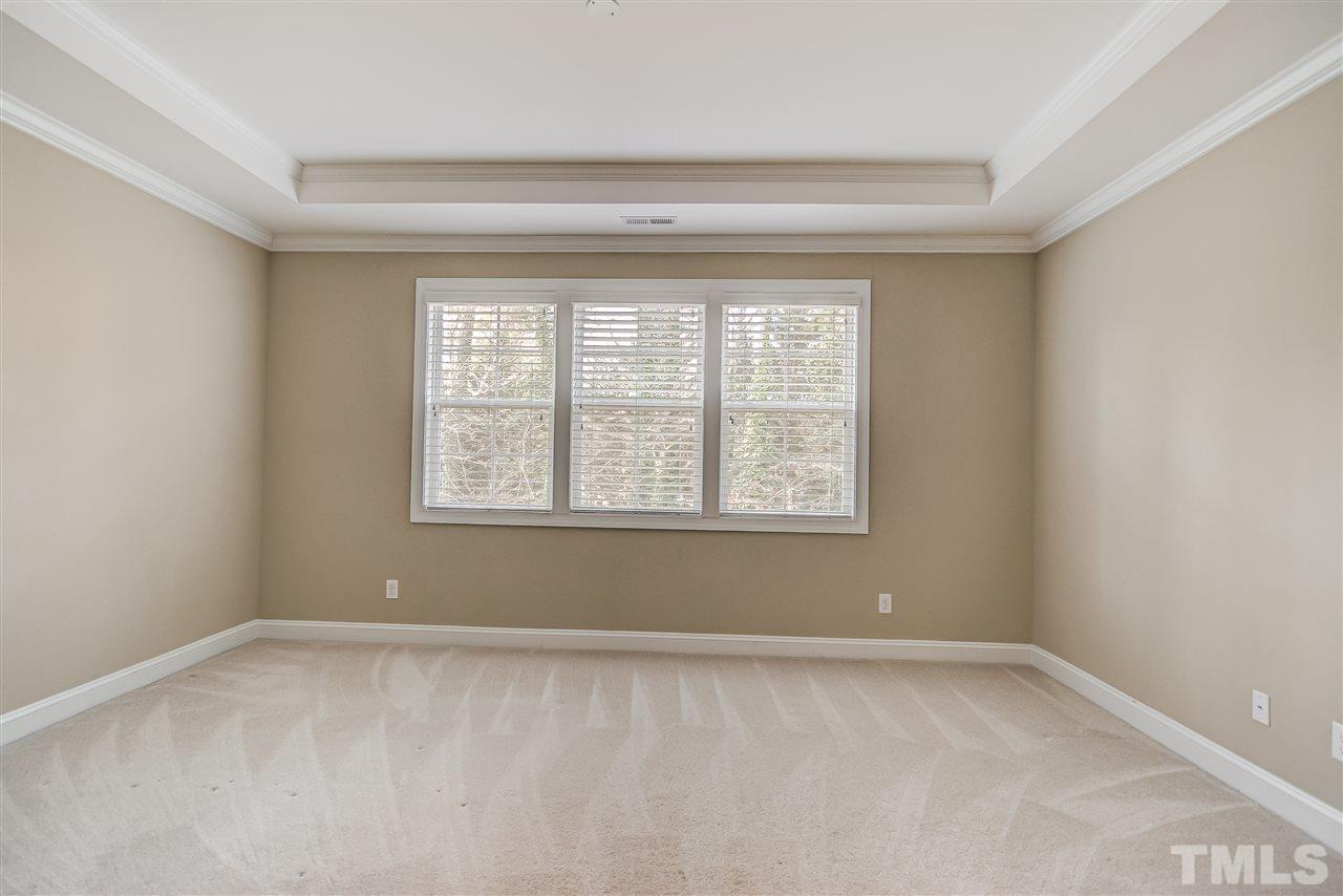 3606 Winifred Way Raleigh, NC 27609 - Photo 8 of 18 an empty room with a window