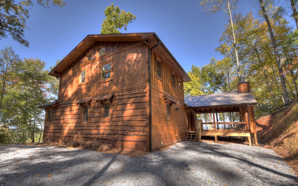 63 Upper Rocky Face Road Blue Ridge, GA 30513 - Photo 1 of 1 a view of a house with a yard